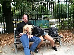 Horny couple gets into strap on sally 15 sucking and licking on a park bench