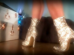 Sparkles Tease - Mesmerizing Goddess teases slaves in her Holiday Boots and uses a metronome