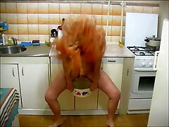 Playful all natural real teen in the kitchen undresses and pisses in the pot