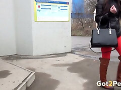 Brunette European chick makes a puddle of pee on the corner