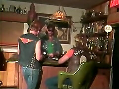 Dirty slut wags her ass standing on a bar counter