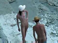 Spy teacher fucks three girls of horny nudist couple fucking doggy style on a beach