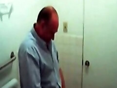 Hidden camera in public toilet caught kinky couple
