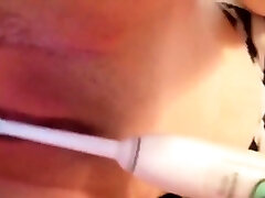 massaging my johnny sins foursomes pussy with a toothbrush