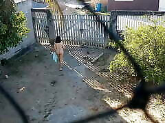 My wife goes outdoor and drops the towel. She walks nude outside